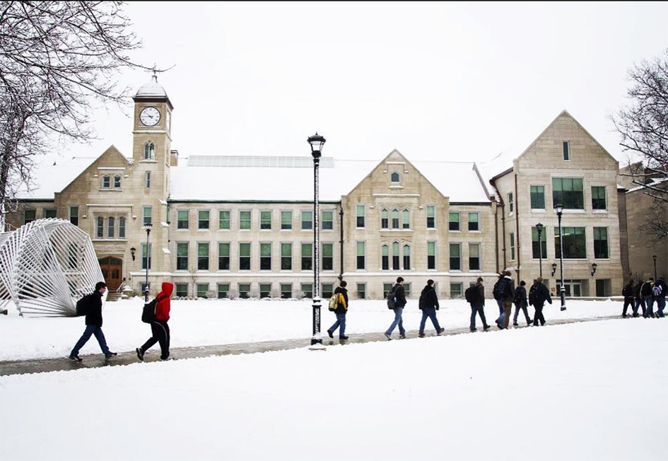 students walking in snow to class