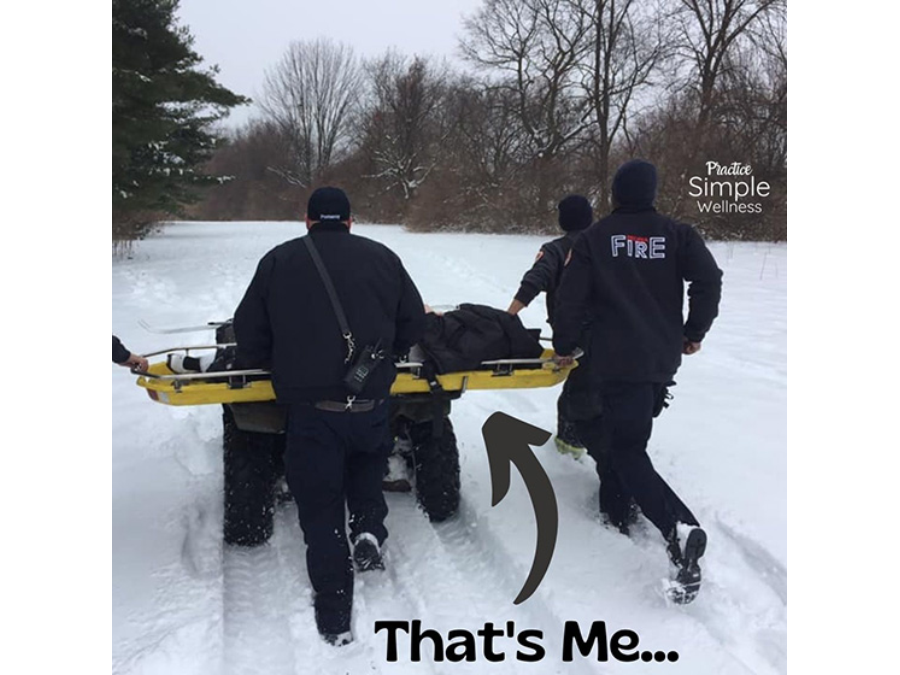 Fire and rescue team in the snow with a stretcher.