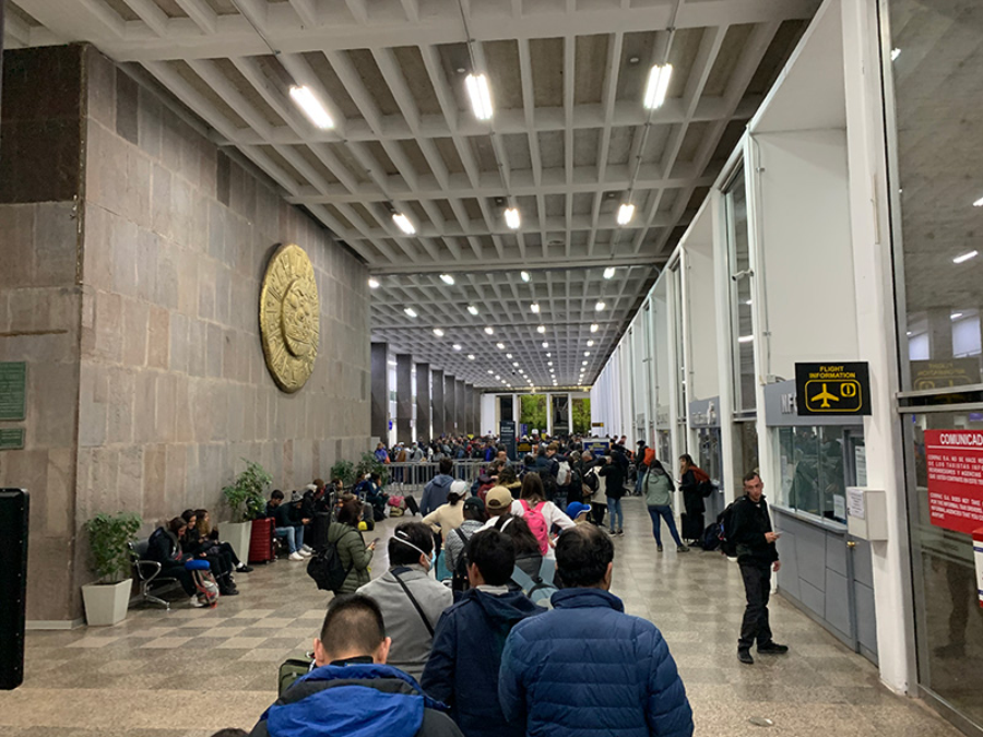 Hundreds of people mass at the airport in Cusco, Peru, trying for a flight out after the government announced the country was being closed due to the coronavirus.