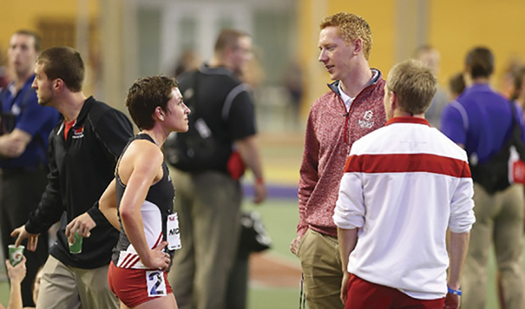 Darren Gauson speaking to Bradley's cross country coach