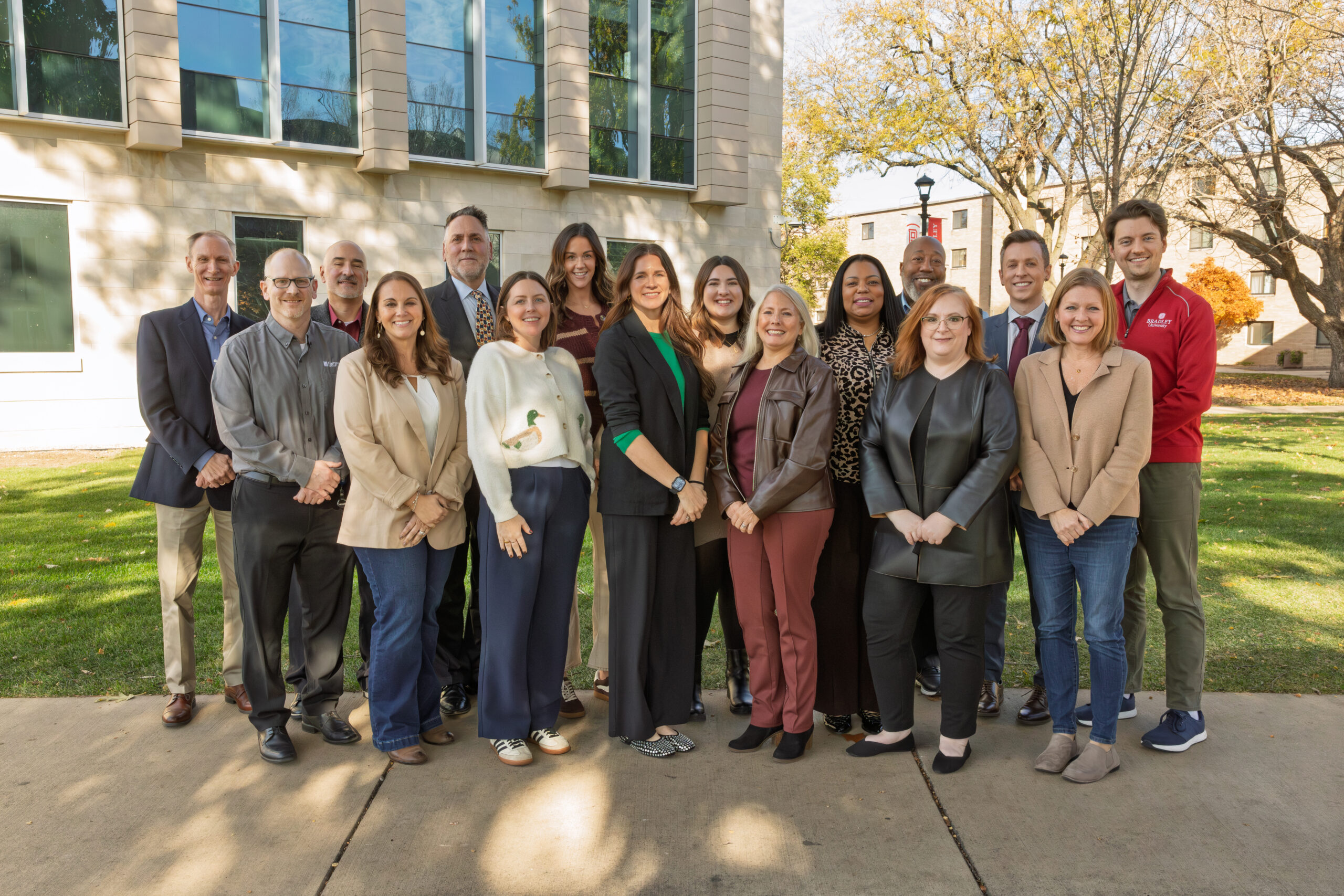 Photo of the Employer Advisory Board members standing outside of the Business and Engineering Convergence Center